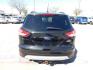 2014 BLACK Ford Escape SE FWD (1FMCU0GX4EU) with an 1.6L L4 DOHC 16V engine, 6-Speed Automatic transmission, located at 2121 Burlington St, North Kansas City, MO, 64116, (816) 556-0707, 39.144707, -94.581978 - Photo#8