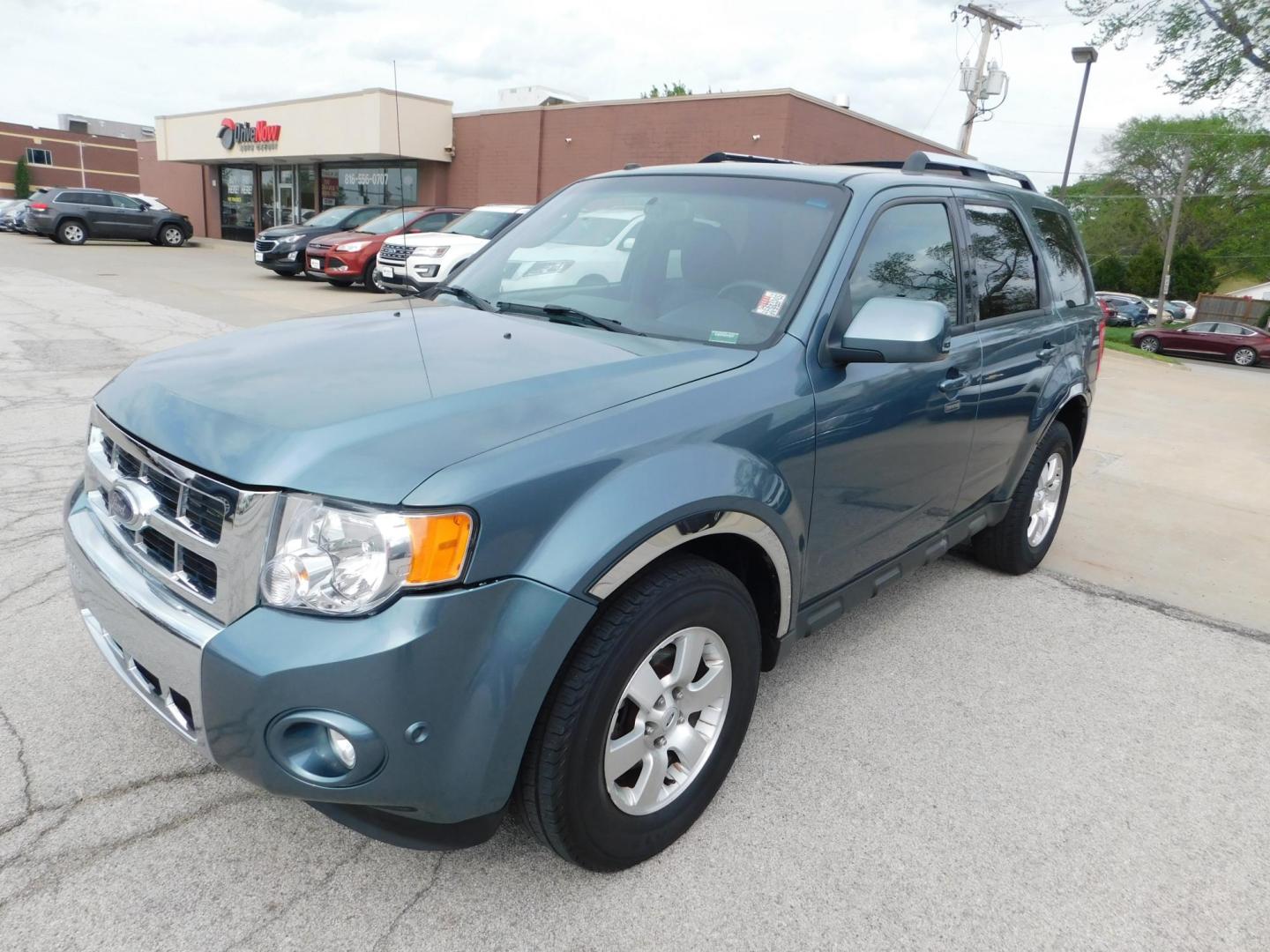 2010 BLUE Ford Escape Limited FWD (1FMCU0EG9AK) with an 3.0L V6 DOHC 24V engine, 6-Speed Automatic transmission, located at 2121 Burlington St, North Kansas City, MO, 64116, (816) 556-0707, 39.144707, -94.581978 - Photo#0
