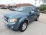 2010 BLUE Ford Escape Limited FWD (1FMCU0EG9AK) with an 3.0L V6 DOHC 24V engine, 6-Speed Automatic transmission, located at 2121 Burlington St, North Kansas City, MO, 64116, (816) 556-0707, 39.144707, -94.581978 - Photo#0
