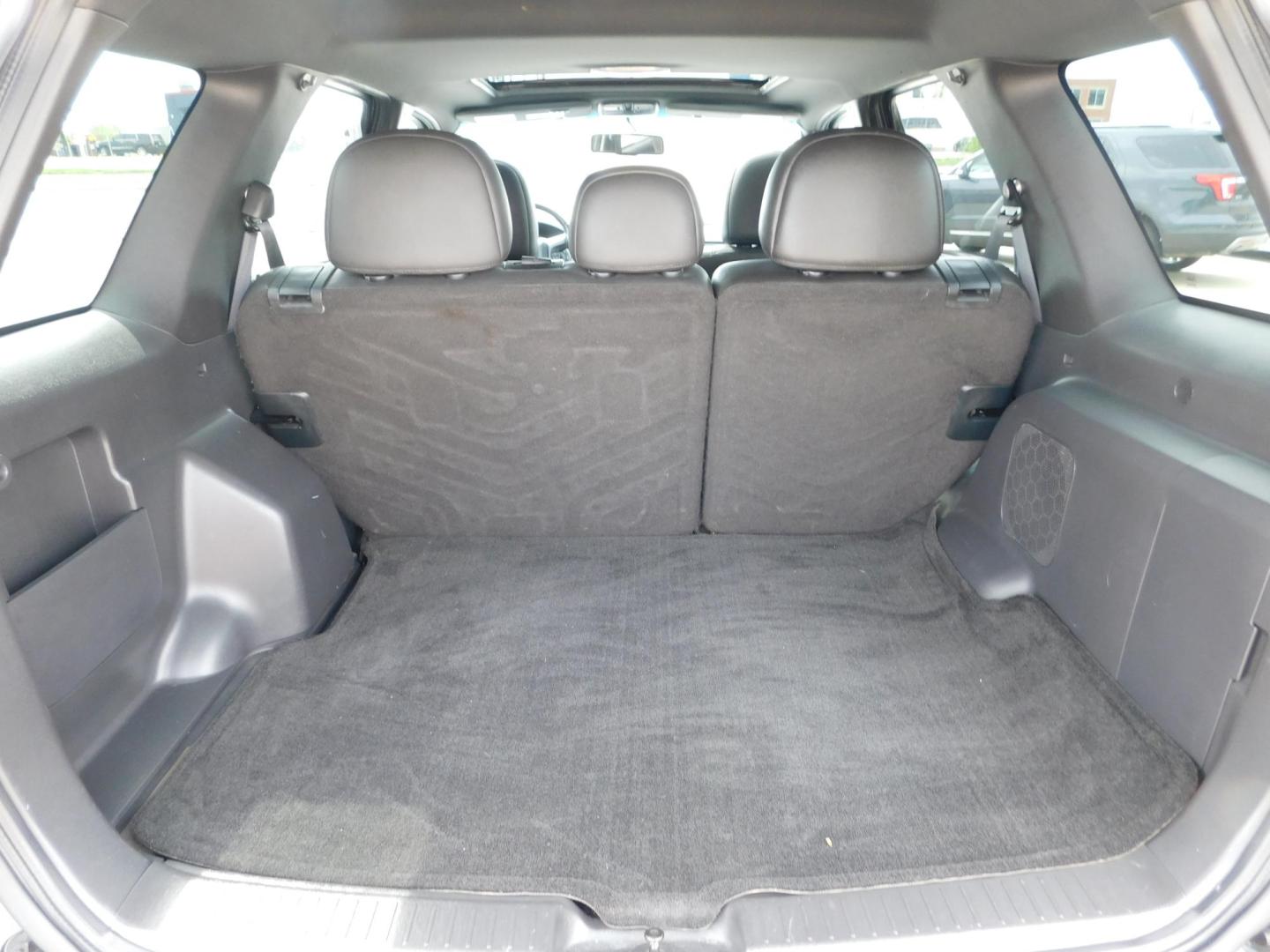 2010 BLUE Ford Escape Limited FWD (1FMCU0EG9AK) with an 3.0L V6 DOHC 24V engine, 6-Speed Automatic transmission, located at 2121 Burlington St, North Kansas City, MO, 64116, (816) 556-0707, 39.144707, -94.581978 - Photo#7