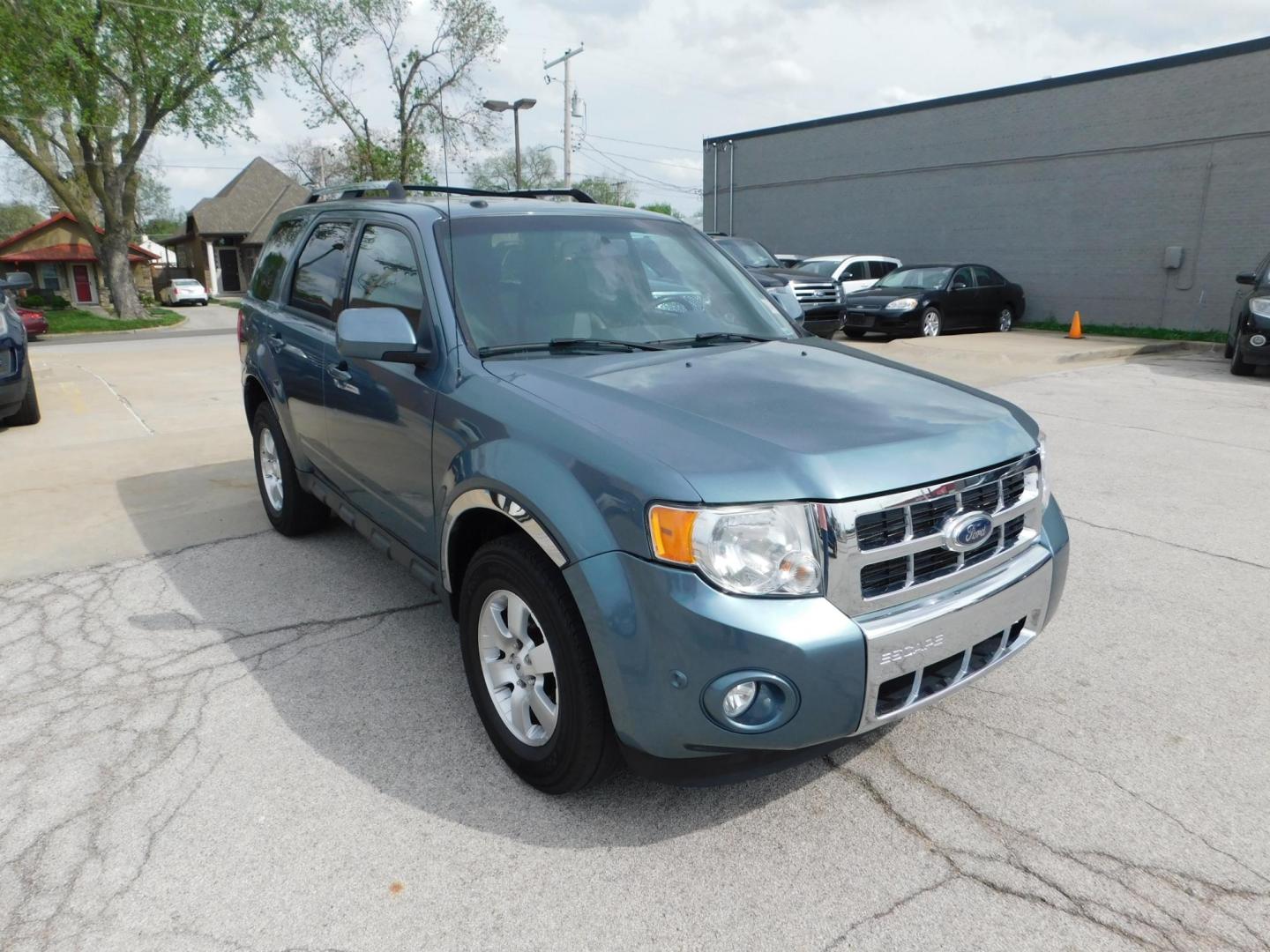 2010 BLUE Ford Escape Limited FWD (1FMCU0EG9AK) with an 3.0L V6 DOHC 24V engine, 6-Speed Automatic transmission, located at 2121 Burlington St, North Kansas City, MO, 64116, (816) 556-0707, 39.144707, -94.581978 - Photo#9