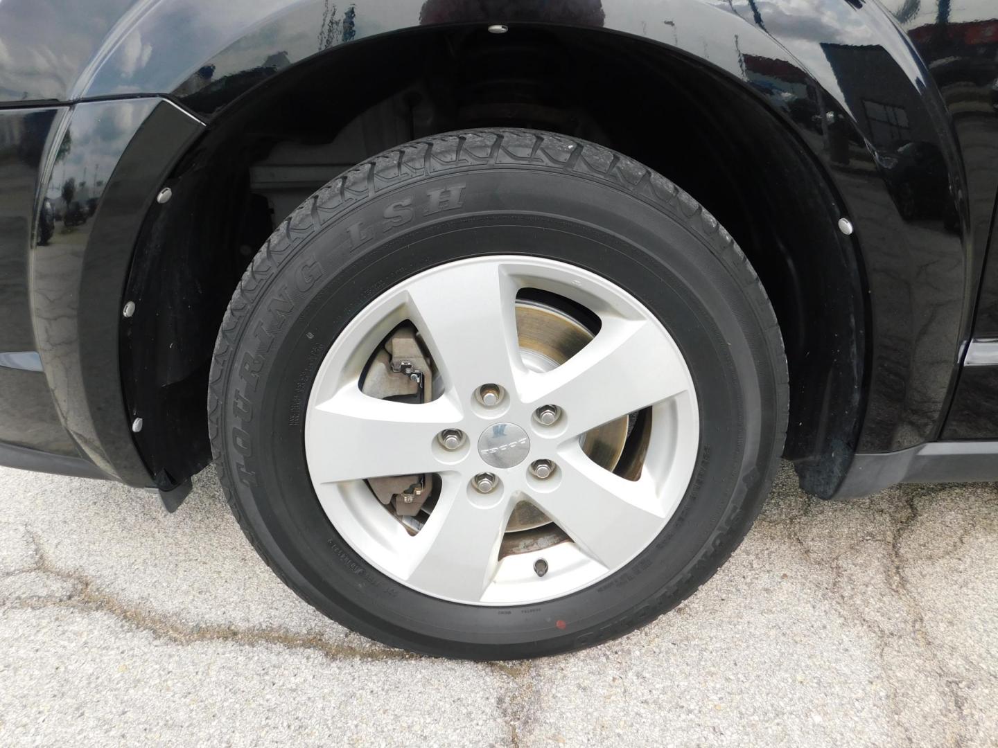 2014 BLACK Dodge Journey SE AWD (3C4PDDAG7ET) with an 3.6L V6 DOHC 24V engine, 6-Speed Automatic transmission, located at 2121 Burlington St, North Kansas City, MO, 64116, (816) 556-0707, 39.144707, -94.581978 - Photo#1
